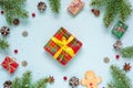 Christmas composition. frame made of fir tree, decorations, red berries, gift boxes and pine cones Royalty Free Stock Photo