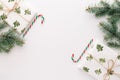 Christmas composition. Gifts, fir branches, red and green Christmas candies, decorations on a white background. The concept of Royalty Free Stock Photo