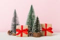 Christmas composition. Gifts, small tree, branches and craft DIY decorations on white background. New year concept Royalty Free Stock Photo