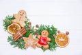 Christmas composition - gingerbread cookies, cedar, fir branches Royalty Free Stock Photo