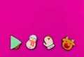 Christmas composition. Gingerbread cookies on a pink background. Christmas tree, snowman, deer and mitten. Flat lay, copy space, t Royalty Free Stock Photo