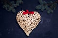 Christmas composition handmade heart on dark background