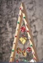 Christmas composition. Christmas interior origami paper decoration, hanging ornament in different colors Royalty Free Stock Photo