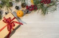 Christmas composition on a light background with gift boxes, with a red ribbon with fir branches, toys, copy space for your Royalty Free Stock Photo