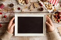 Christmas composition. Man holding picture frame. Studio shot. Royalty Free Stock Photo