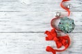 Christmas composition, mockup with green cactus aloe succulent plant, red ribbon, bow and silver Christmas ornament Royalty Free Stock Photo