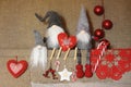 Christmas composition. Noel gnome backgrouGifts, red decorations on linen background. Christmas, winter, new year concept. Flat la Royalty Free Stock Photo