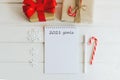 Christmas composition with Notepad with goals for 2021