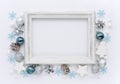Christmas composition. Photo frame, christmas decorations on white background. Flat lay, top view, copy space Royalty Free Stock Photo