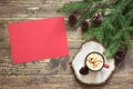 Christmas composition with red cup and empty red blank letter for Santa or your wishlist or advent activities.