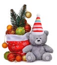 Christmas composition with santa claus bag full of toys and smiling teddy bear