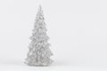 Christmas composition. Silver Christmas tree on a silver background. Happy Holidays Royalty Free Stock Photo