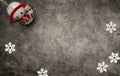 Christmas composition of snowflakes and happy snowman on a modern grey wash background isolated Royalty Free Stock Photo