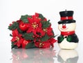 Christmas composition,snowman and red flowers