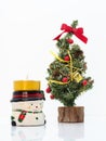 Christmas composition,snowman and a small christmas tree