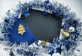 Christmas composition. Vintage Christmas greeting card. Blue sparkling ribbon wreath. Royalty Free Stock Photo