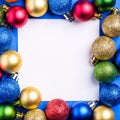 Christmas composition with white square copy space. Colorful ornament and baubles decorations Royalty Free Stock Photo