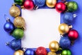 Christmas composition with white square copy space. Colorful ornament and baubles decorations Royalty Free Stock Photo