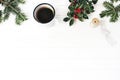 Christmas composition. Winter breakfast still life scene. Frame of fir tree branches, holly leaves and berries, silk Royalty Free Stock Photo