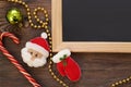 Christmas composition on a wooden background of handmade felt toys flat lay. Wooden frame with copy space. Candy cane Royalty Free Stock Photo