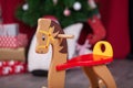 Christmas composition. Wooden rocking horse Royalty Free Stock Photo