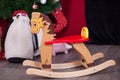 Christmas composition with wooden rocking horse Royalty Free Stock Photo