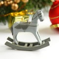 Christmas composition with wooden toy rocking horse Royalty Free Stock Photo