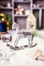 Christmas composition with wooden toy rocking horse Royalty Free Stock Photo