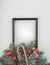 Christmas concept background.Black frame with christmas decoration and fir tree branches Royalty Free Stock Photo