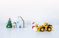 Christmas concept background, Yellow truck moving snowman over blurred background Royalty Free Stock Photo