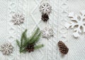 Christmas concept. Christmas bouquet with spruce, fir-tree, snowflakes on white knitted background. Holiday card. Vintage style. F Royalty Free Stock Photo