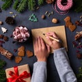 Christmas concept, child hands writing letter to Santa Claus Royalty Free Stock Photo