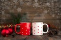 Christmas concept composition with a mug on a wooden table.