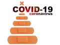 Christmas concept during Covid-19 Coronavirus pandemic. Christmas tree with various strips of adhesive bandages plaster