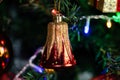 Christmas concept. Decorated Christmas tree, Fir braches with hanging decorations and garlands. Christmas bell