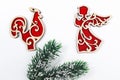 christmas concept Fir tree branch, red wooden toys angel and coc