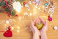 Christmas concept. Human hand hold a glass christmas bauble Royalty Free Stock Photo