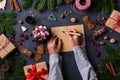 Christmas concept, child hands writing letter to Santa Claus Royalty Free Stock Photo