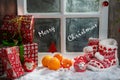 Christmas concept with oranges with snow, wooden window background Royalty Free Stock Photo