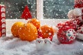 Christmas concept with oranges with snowflakes, wooden window background Royalty Free Stock Photo