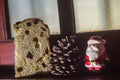 christmas concept with panettone and soft toys , window to funff and copy space