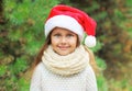 Christmas concept - portrait little girl child in santa red hat Royalty Free Stock Photo