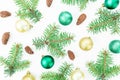 Christmas concept of winter trees, pine cones and Christmas balls on white background. New year composition. Flat lay, top view Royalty Free Stock Photo