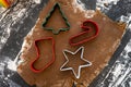 Christmas Cookie Cutters in Gingerbread Dough Royalty Free Stock Photo