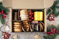 Christmas cookie gift box. Assorted shortbread cookies with holiday decoration. Care package concept