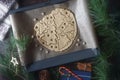 Christmas cookie preparation on the wooden table with different accessorizes