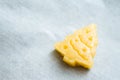 Christmas cookies for children, making gingerbread in form of fir tree close-up. Recipe and raw dough of New year treat. Homemade Royalty Free Stock Photo