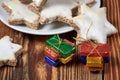 Christmas cookies and parcels on wooden table Royalty Free Stock Photo