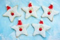 Christmas cookies santa claus, creative idea for treats kids, funny edible santas of star cookies recipe Royalty Free Stock Photo