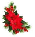 Christmas corner arrangement with pine twigs, red berries and poinsettia flowers Royalty Free Stock Photo